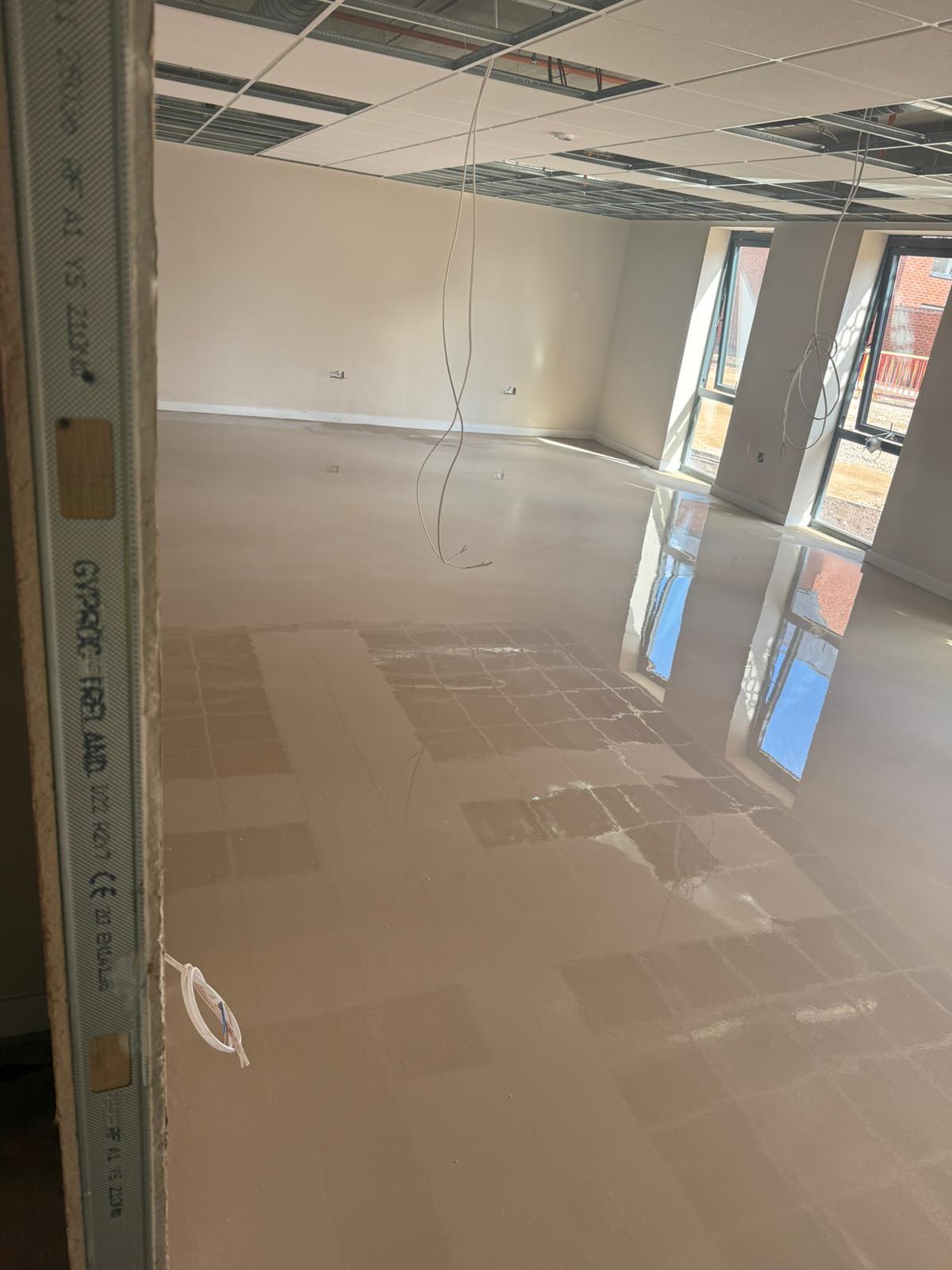 Commercial floor preparation with self-levelling screed