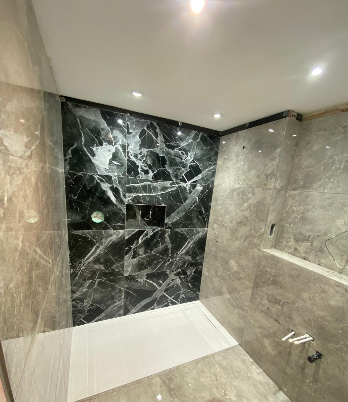 Large format porcelain tiling and wet room installation