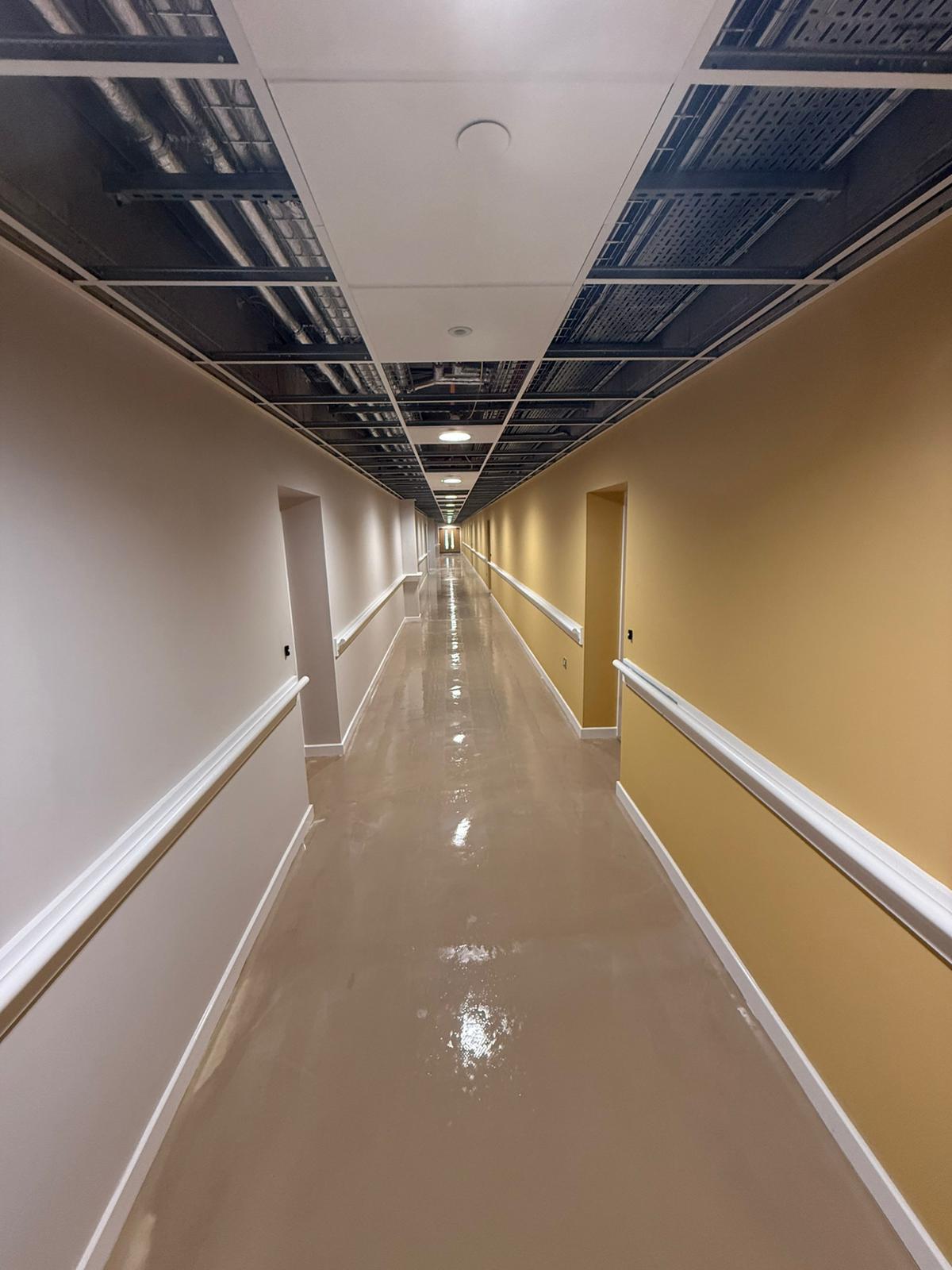 Resin or sealed floor coating in commercial corridor