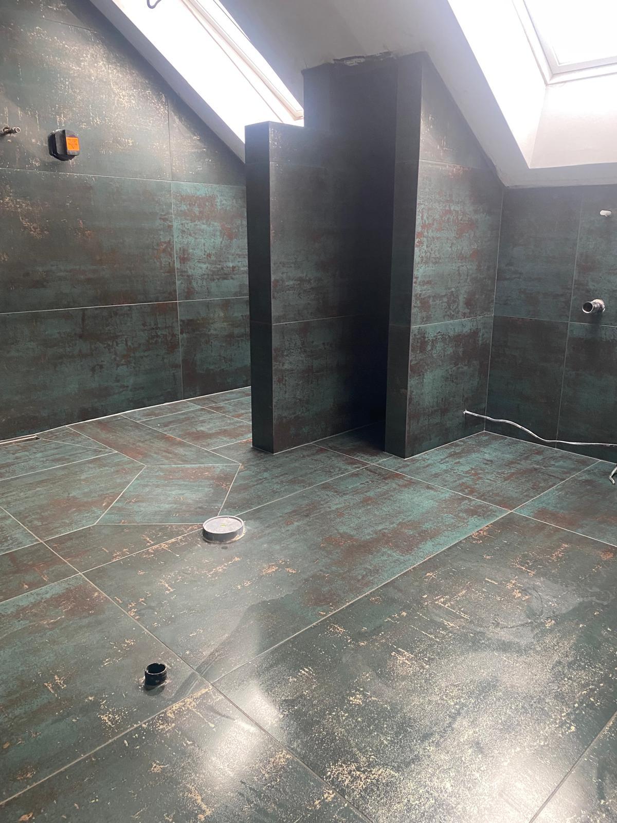 Large format porcelain tiled bathroom with underfloor preparation