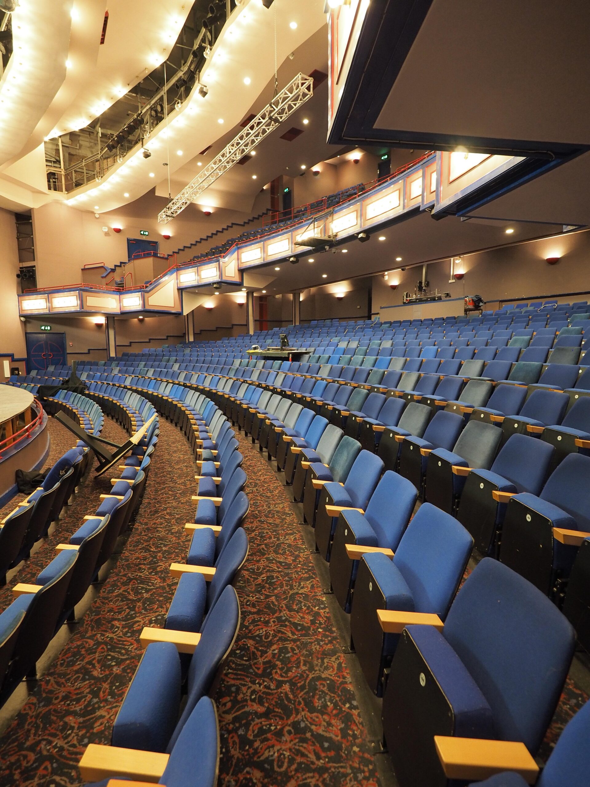 Auditorium seating with patterned carpet installation in theatre